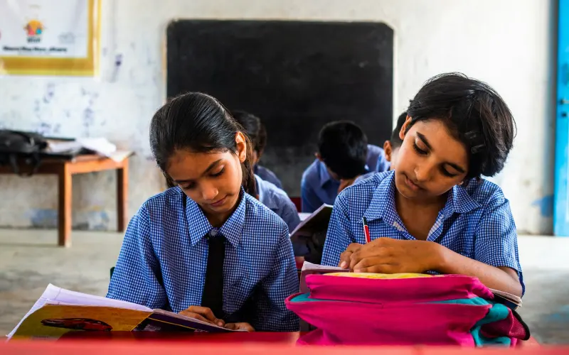 Children studying together in a classroom