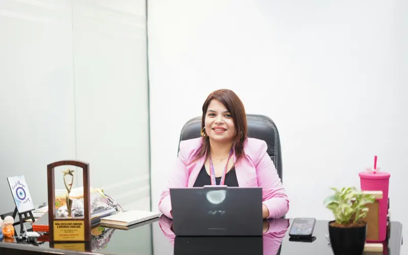 Consultant working at her office desk